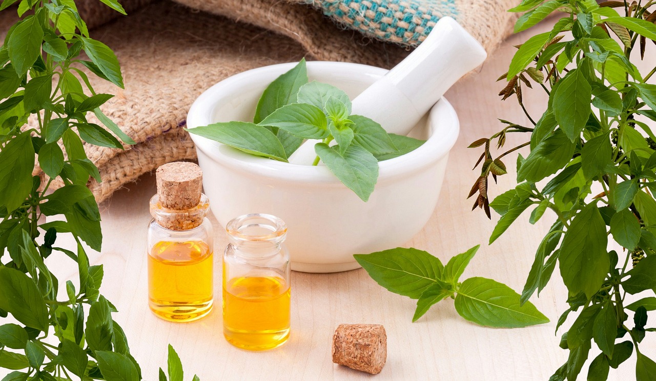 essential oils w basil and a mortar and pestle essential oils w basil and a mortar and pestle