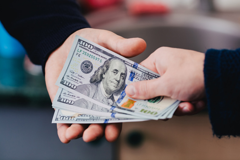 Money changing hands